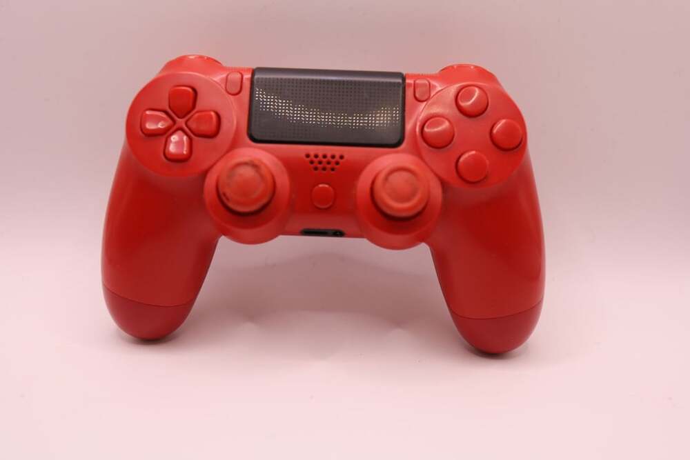 Sony DualShock 4 Wireless Controller for PlayStation 4 - Magma Red